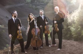 Imatge dels 4 membres del Cuarteto Quiroga amb els seus instruments musicals